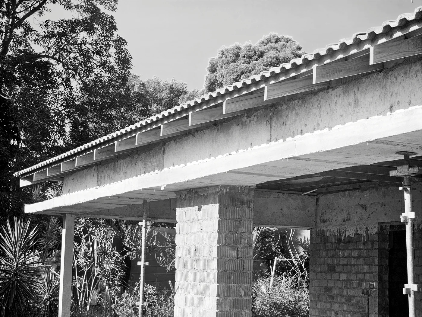 Existing concrete and masonry construction with roof framing