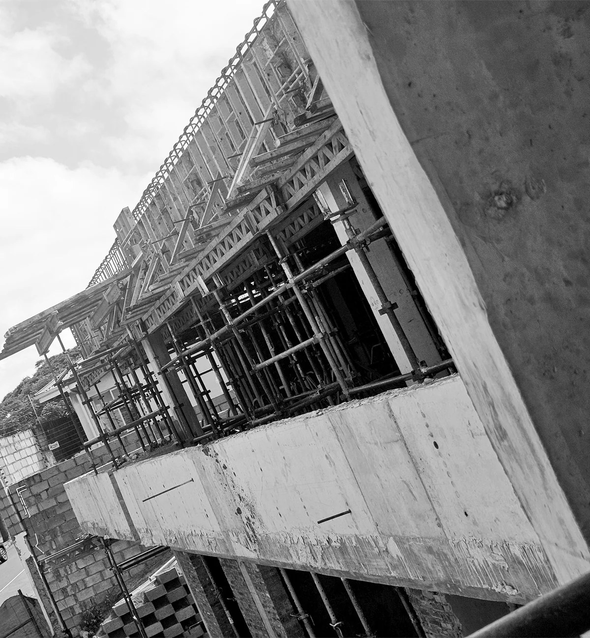 Concrete frame and formwork on a residential-scale building